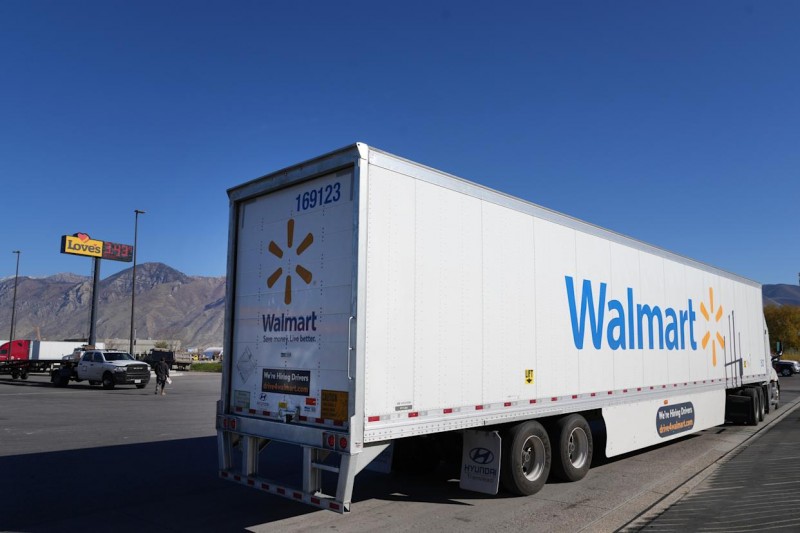 SPRINGVILLE, UT - NOVEMBER 05: A Walmart truck pulls away after fueling up along with other truckers at the Loves Truck stop on November 5, 2021 in Springville, Utah. A shortage of truck drivers has added to transportation issues contributing to global market supply chain disruptions. (Photo by George Frey/Getty Images)