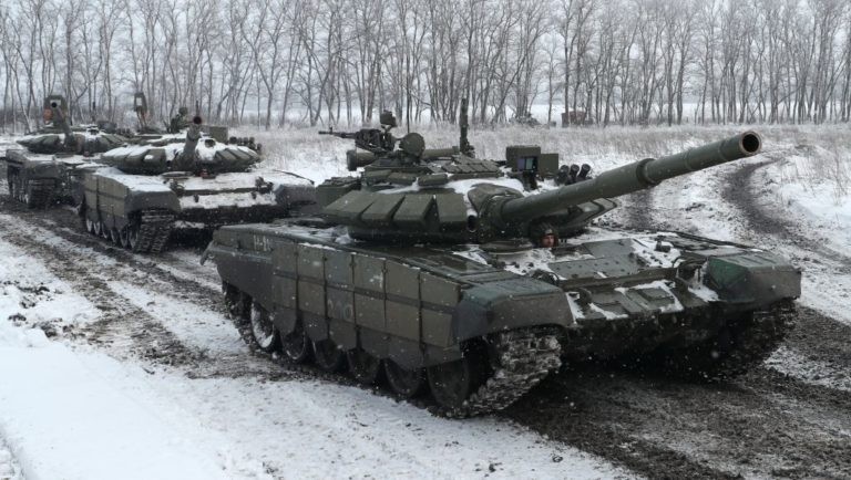 A picture containing military vehicle, outdoor, ground, snow

Description automatically generated