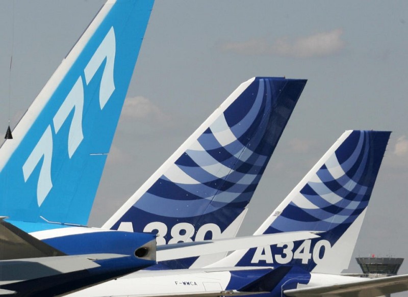 The tails of a Boeing 777, the Airbus A380 and A340 at the Paris Air Show years ago. The United States and European Union agreed to suspend for five years the tariff war over a recent WTO decision in a case that dates to 2004.