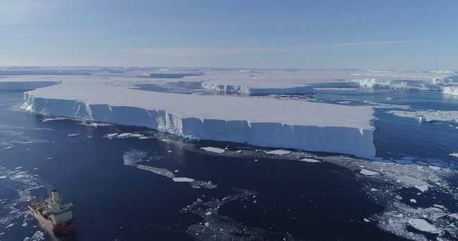 The US Antarctic Program research vessel Nathaniel B. Palmer is seen working near the Thwaites Eastern Ice Shelf in 2019.