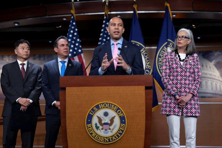 House Minority Leader Hakeem Jeffries, D-N.Y., joined from left by Rep. Ted Lieu D-Calif., the Democratic Caucus vice chair, Rep. Pete Aguilar, D-Calif., the Democratic Caucus chair, and Rep. Katherine Clark, D-Mass., the Democratic whip, talks to reporters about the closed-door meeting they had with fellow Democrats on the debt limit deal, at the Capitol in Washington, Wednesday, May 31, 2023. The agreement negotiated by Speaker of the House Kevin McCarthy, R-Calif., and President Joe Biden, will be voted on in the House later tonight. (AP Photo/J. Scott Applewhite)